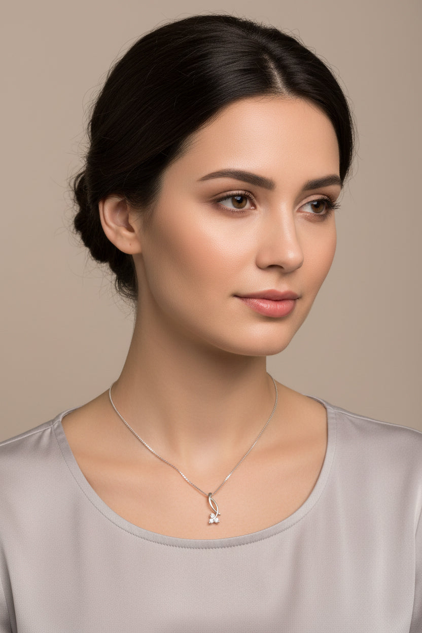 9ct white gold diamond drop pendant necklace worn on neck - for illustration purposes only