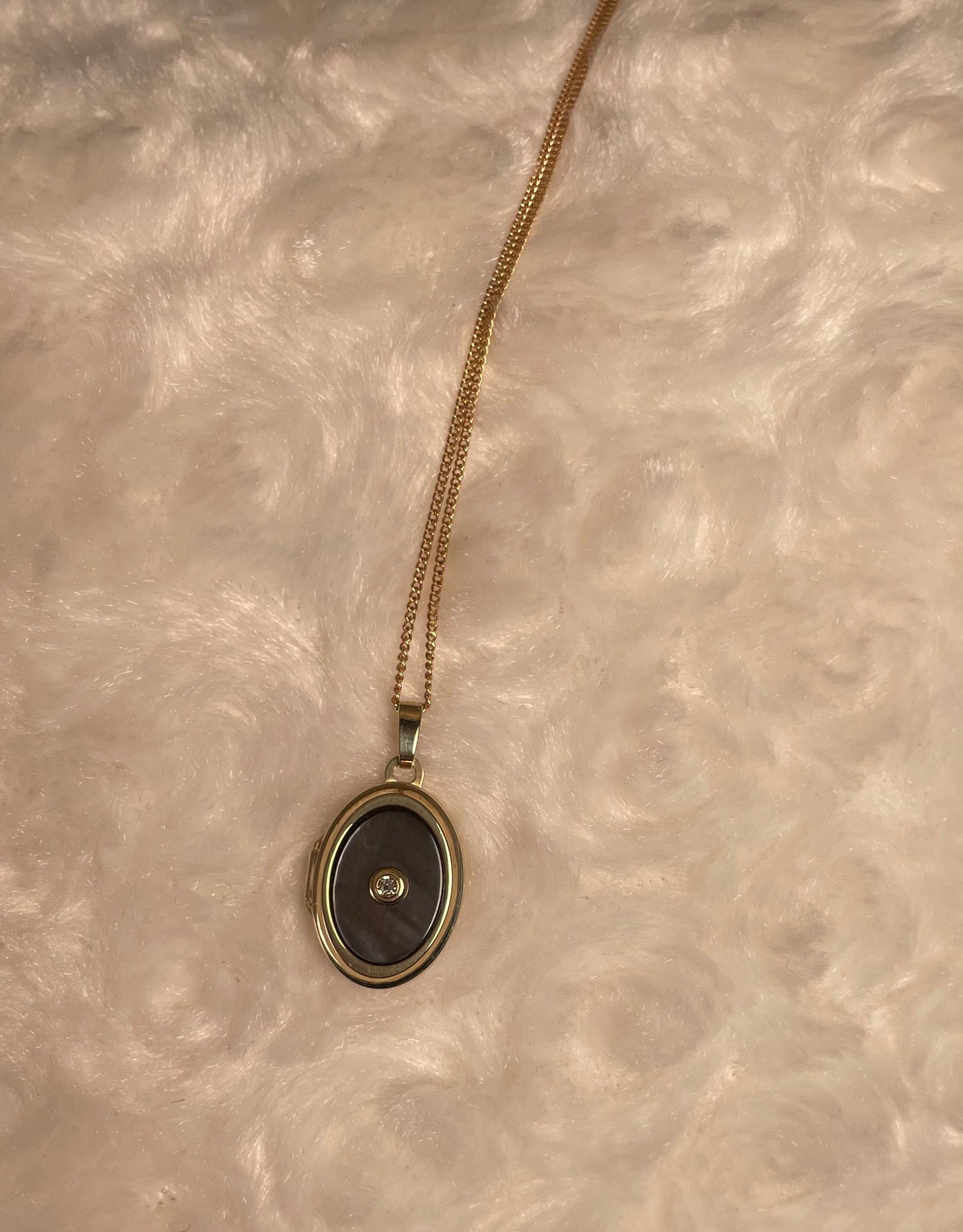 9ct Yellow Gold Grey Mother of Pearl Oval Locket With Small Diamond Centre