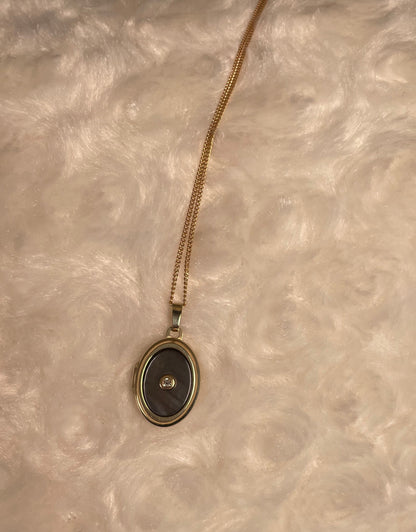 9ct Yellow Gold Grey Mother of Pearl Oval Locket With Small Diamond Centre