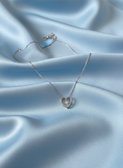 9ct White Gold Open Heart Pendant with Suspended Diamond