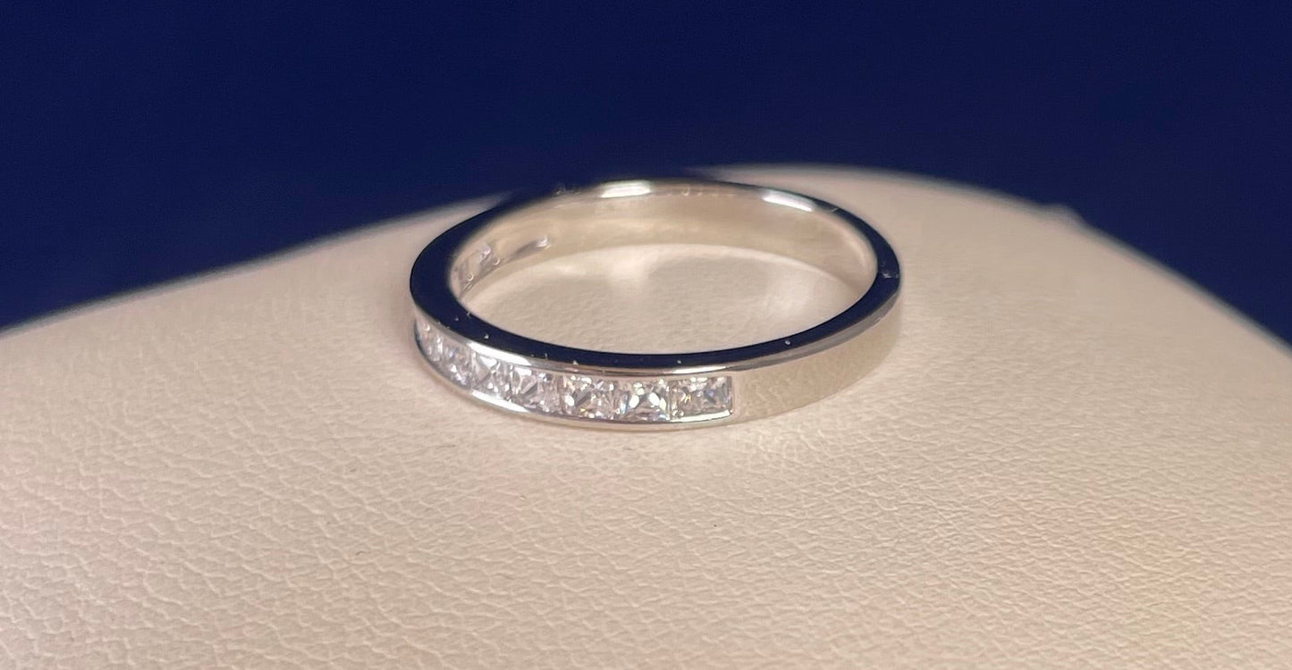Half Eternity Channel Set Princess Cut Cubic Zirconia Rhodium Plated