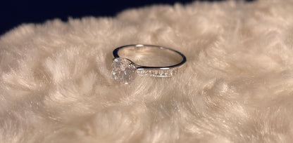 Brilliant Cut Cubic Zirconia Solitaire With Baguette CZ on Shoulder Rhodium Plated