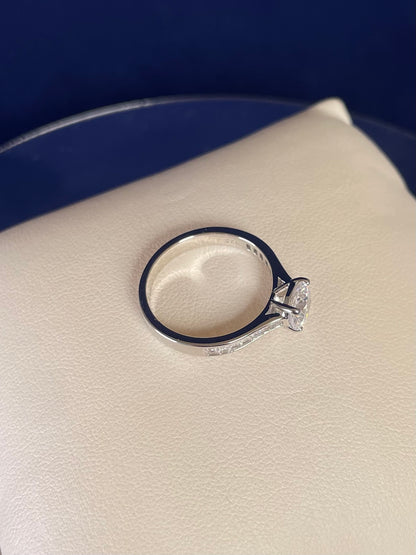 Brilliant Cut Cubic Zirconia Solitaire With Baguette CZ on Shoulder Rhodium Plated