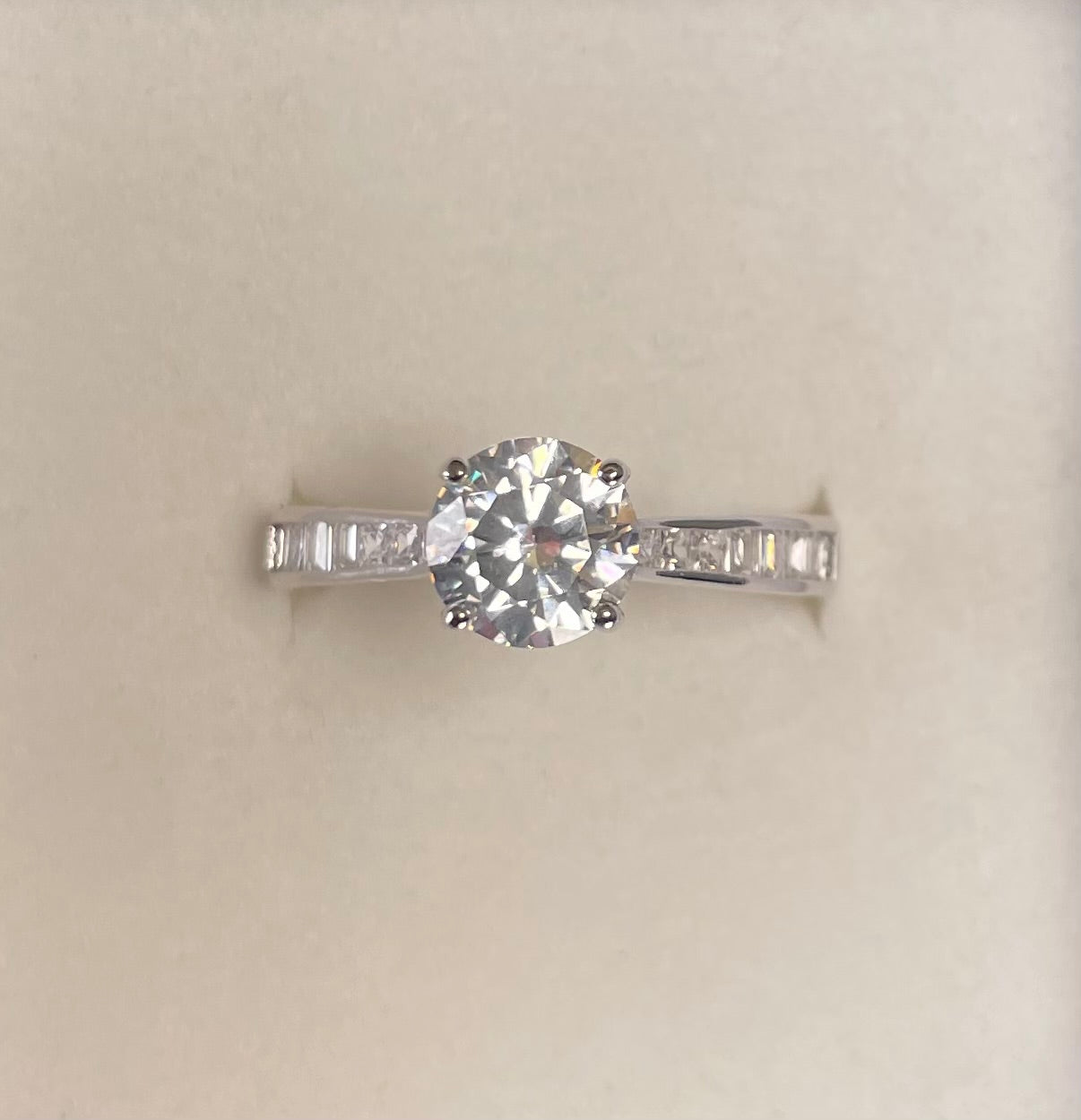 Brilliant Cut Cubic Zirconia Solitaire With Baguette CZ on Shoulder Rhodium Plated