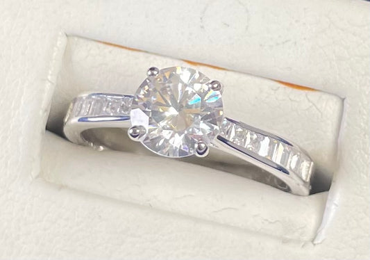 Brilliant Cut Cubic Zirconia Solitaire With Baguette CZ on Shoulder Rhodium Plated