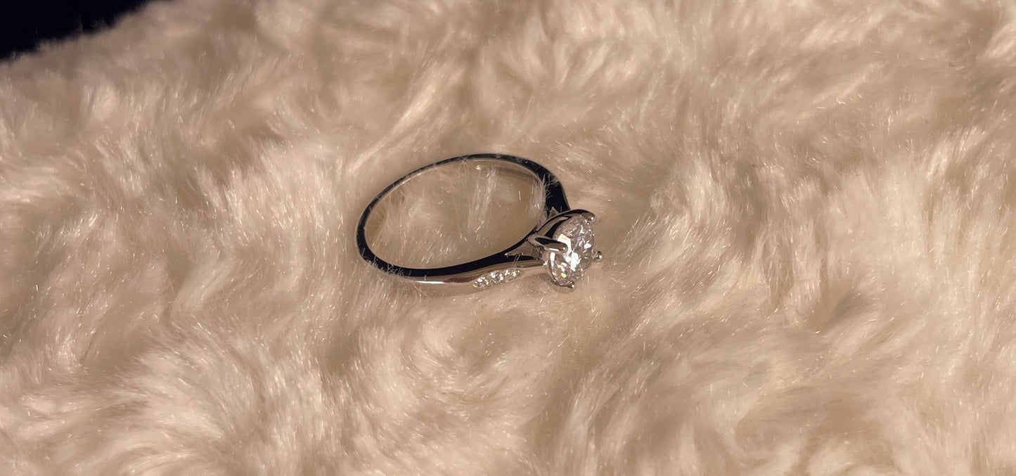 Rhodium-Plated Silver Brilliant Cut Cubic Zirconia Solitaire With Cubic Zirconia On Shoulder