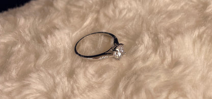 Rhodium-Plated Silver Brilliant Cut Cubic Zirconia Solitaire With Cubic Zirconia On Shoulder