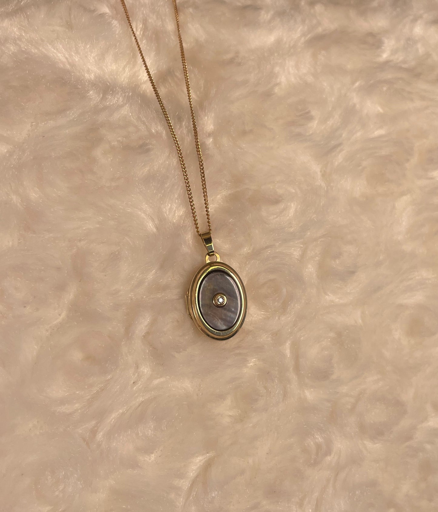 9ct Yellow Gold Grey Mother of Pearl Oval Locket With Small Diamond Centre
