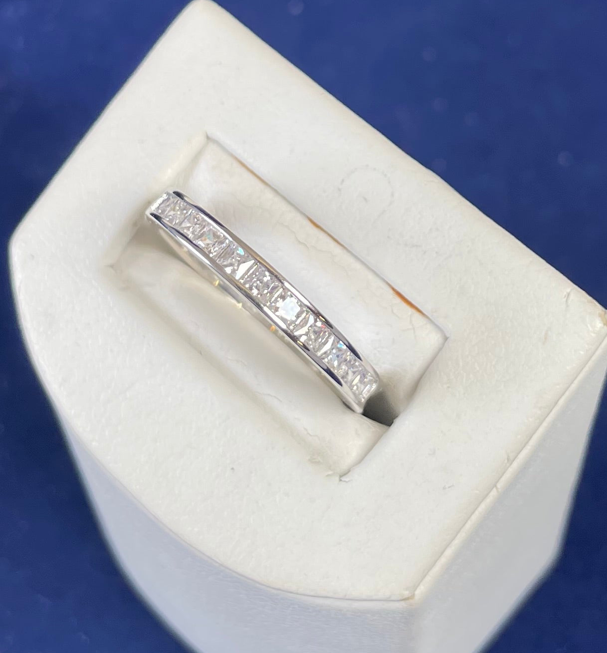 Rhodium-Plated Silver Half Eternity Channel Set Princess Cut Cubic Zirconia