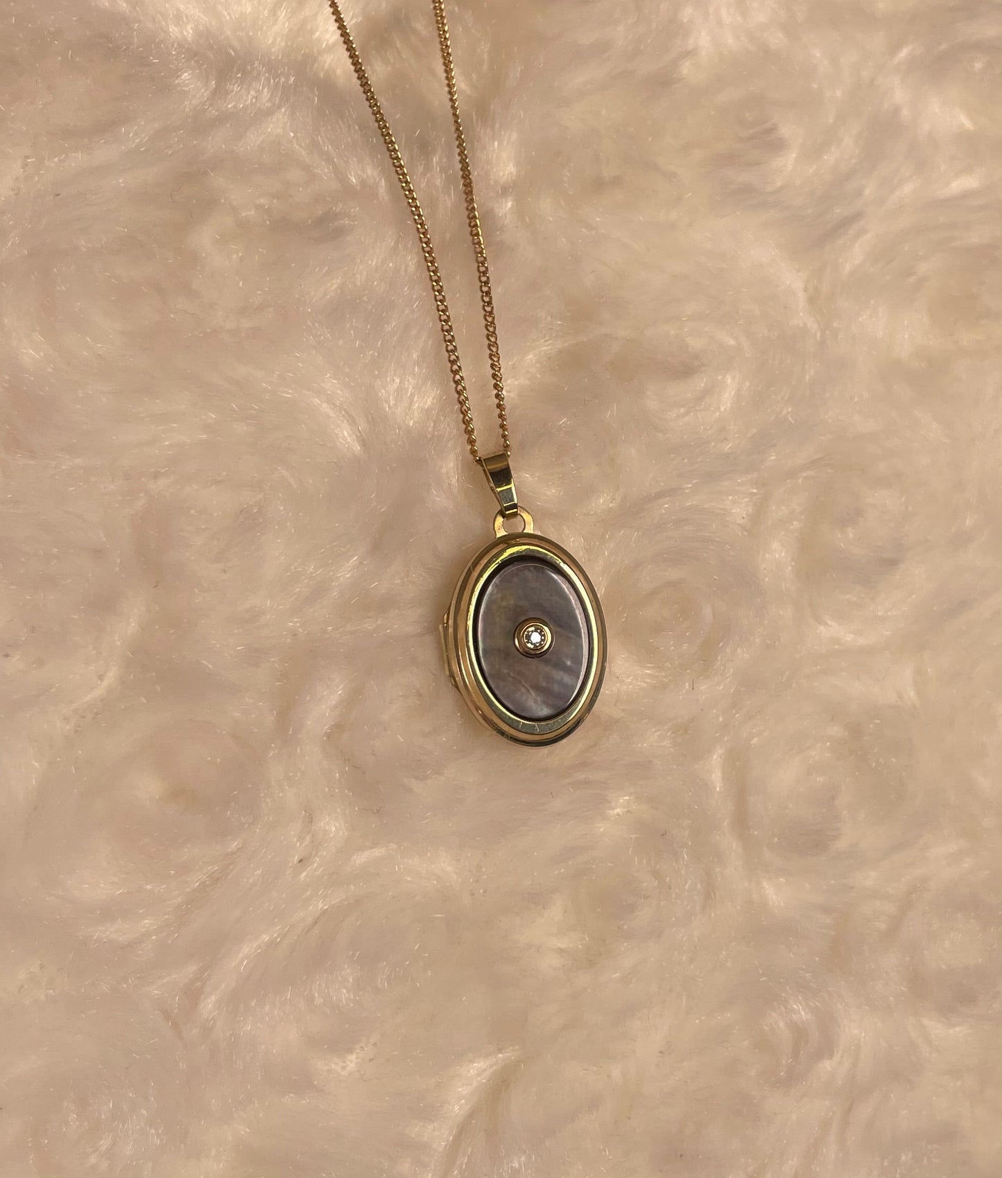9ct Yellow Gold Grey Mother of Pearl Oval Locket With Small Diamond Centre