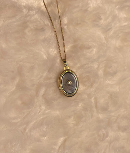 9ct Yellow Gold Grey Mother of Pearl Oval Locket With Small Diamond Centre