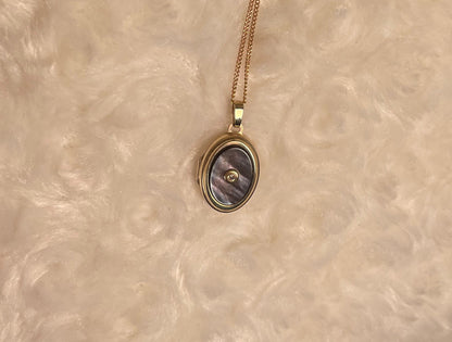 9ct Yellow Gold Grey Mother of Pearl Oval Locket With Small Diamond Centre