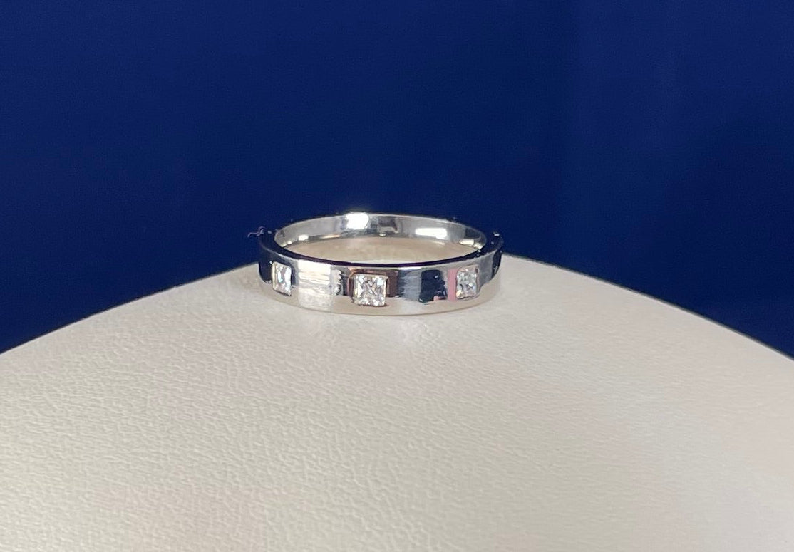 Flat Court Band with three Princess Cut Cubic Zirconicas Ring