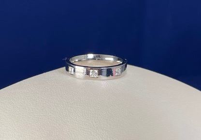Flat Court Band with three Princess Cut Cubic Zirconicas Ring