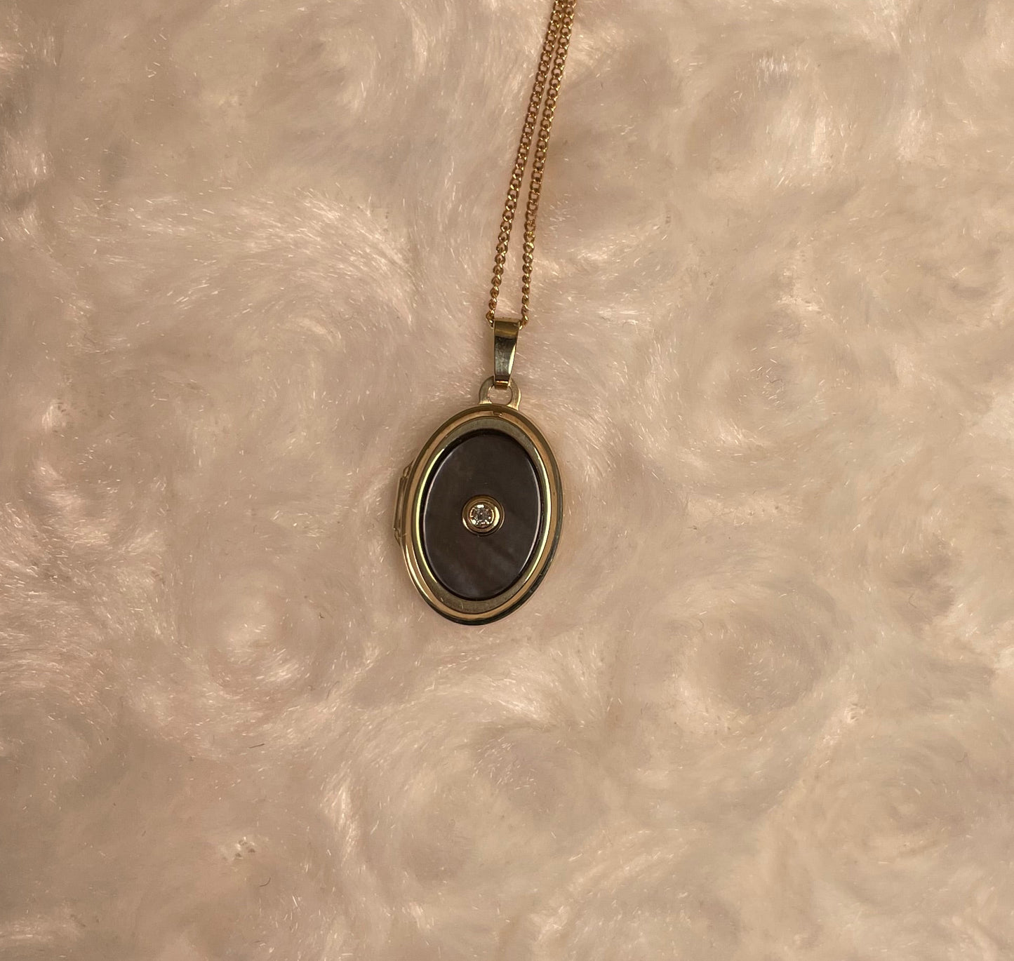 9ct Yellow Gold Grey Mother of Pearl Oval Locket With Small Diamond Centre