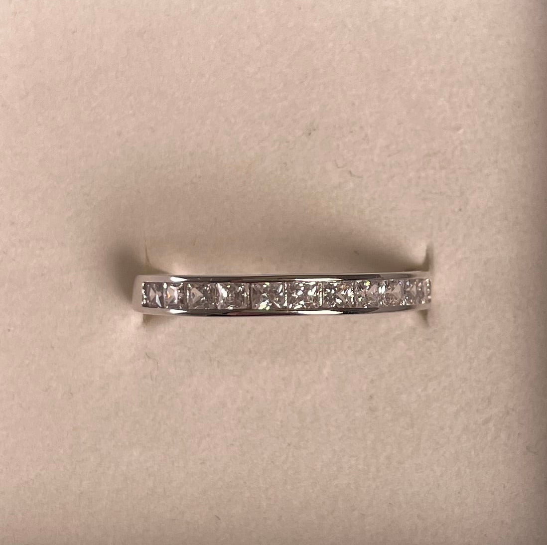 Half Eternity Channel Set Princess Cut Cubic Zirconia Rhodium Plated