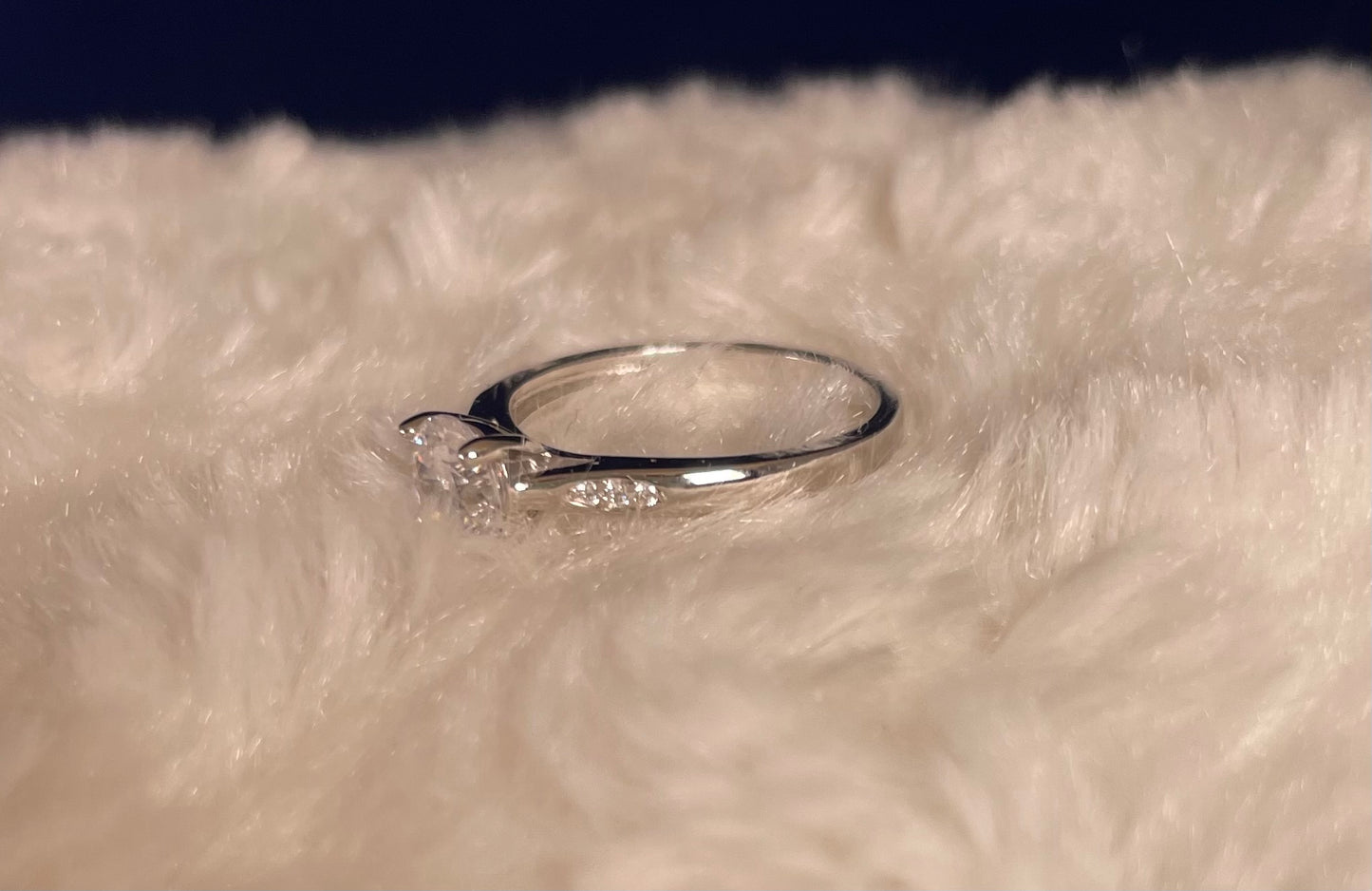 Rhodium-Plated Silver Brilliant Cut Cubic Zirconia Solitaire With Cubic Zirconia On Shoulder