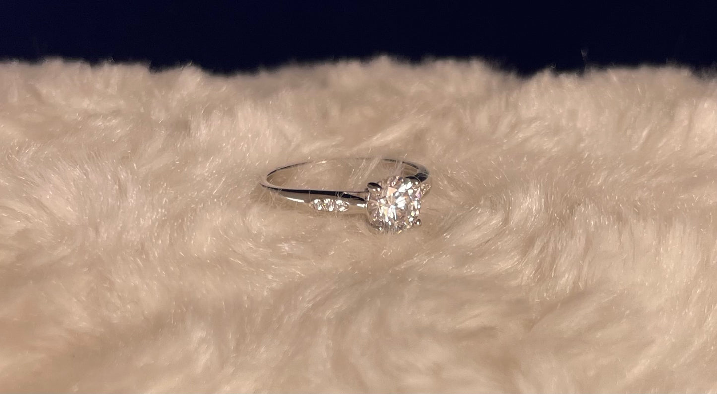 Rhodium-Plated Silver Brilliant Cut Cubic Zirconia Solitaire With Cubic Zirconia On Shoulder
