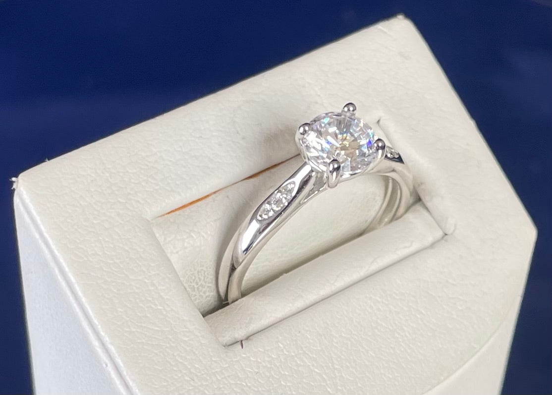 Brilliant Cut Cubic Zirconia Solitaire With Cubic Zirconia On Shoulder Rhodium plated
