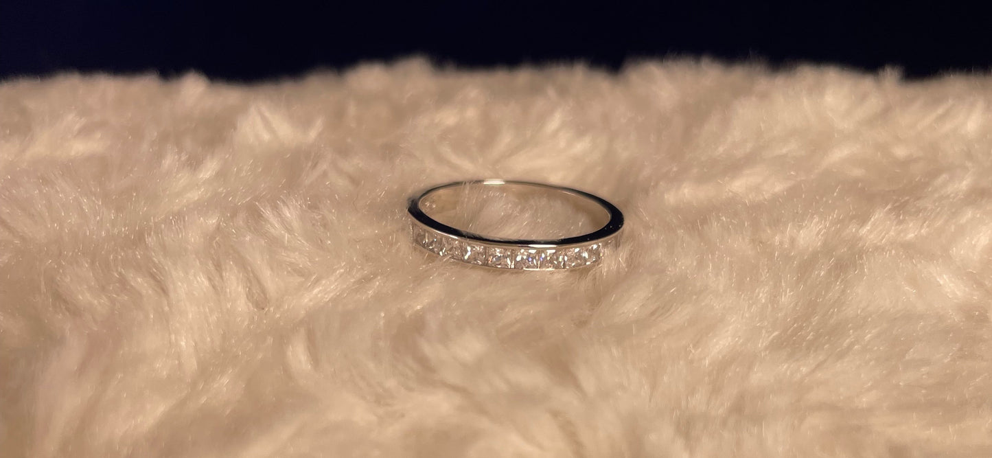 Half Eternity Channel Set Princess Cut Cubic Zirconia Rhodium Plated