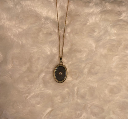 9ct Yellow Gold Grey Mother of Pearl Oval Locket With Small Diamond Centre