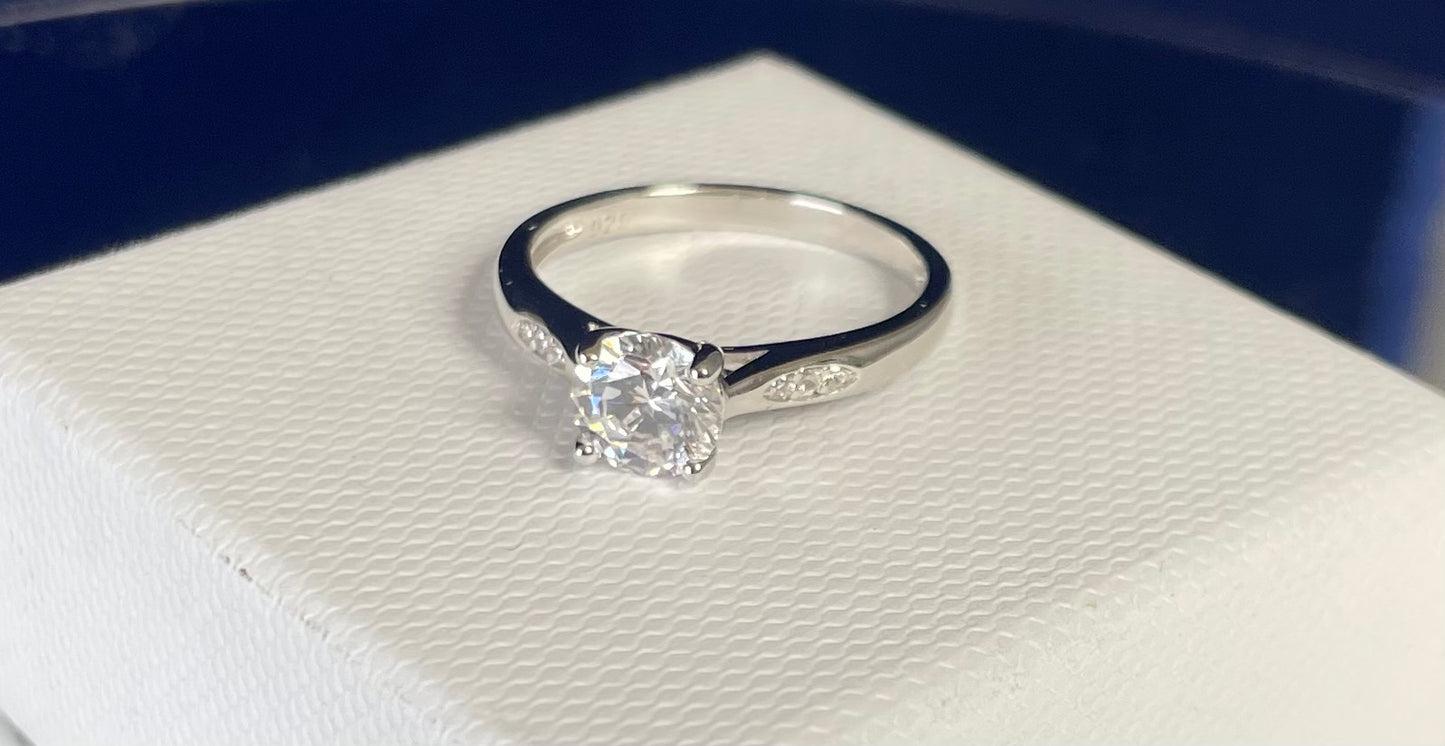 Brilliant Cut Cubic Zirconia Solitaire With Cubic Zirconia On Shoulder Rhodium plated