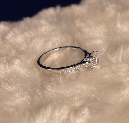 Rhodium-Plated Silver Brilliant Cut Cubic Zirconia Solitaire With Baguette CZ on Shoulder