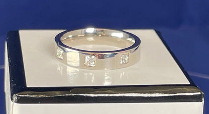 Rhodium-Plated Silver Flat Court Band with Three Princess Cut Cubic Zirconica Ring