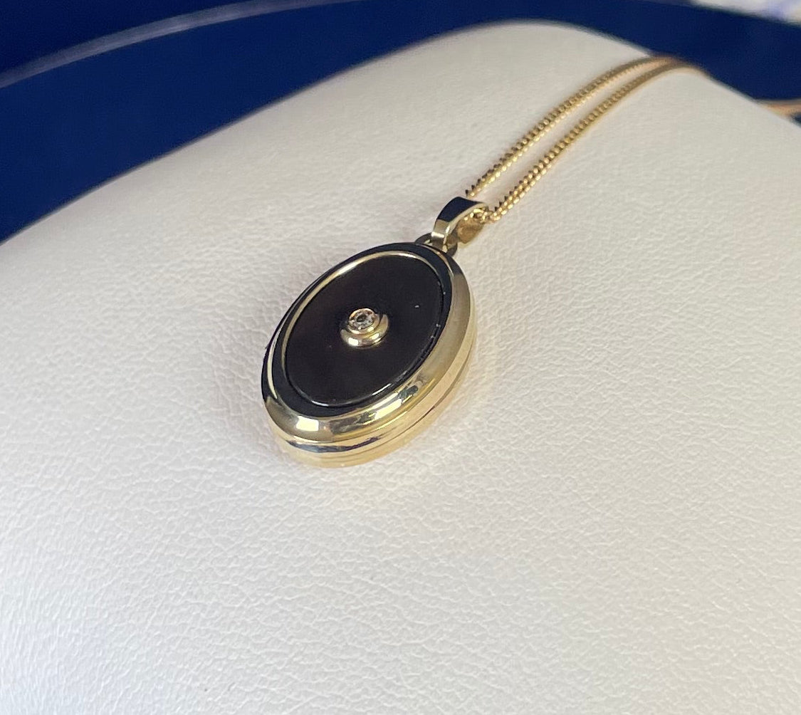 9ct Yellow Gold Grey Mother of Pearl Oval Locket With Small Diamond Centre