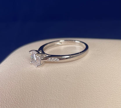 Rhodium-Plated Silver Brilliant Cut Cubic Zirconia Solitaire With Cubic Zirconia On Shoulder