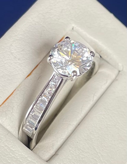Brilliant Cut Cubic Zirconia Solitaire With Baguette CZ on Shoulder Rhodium Plated