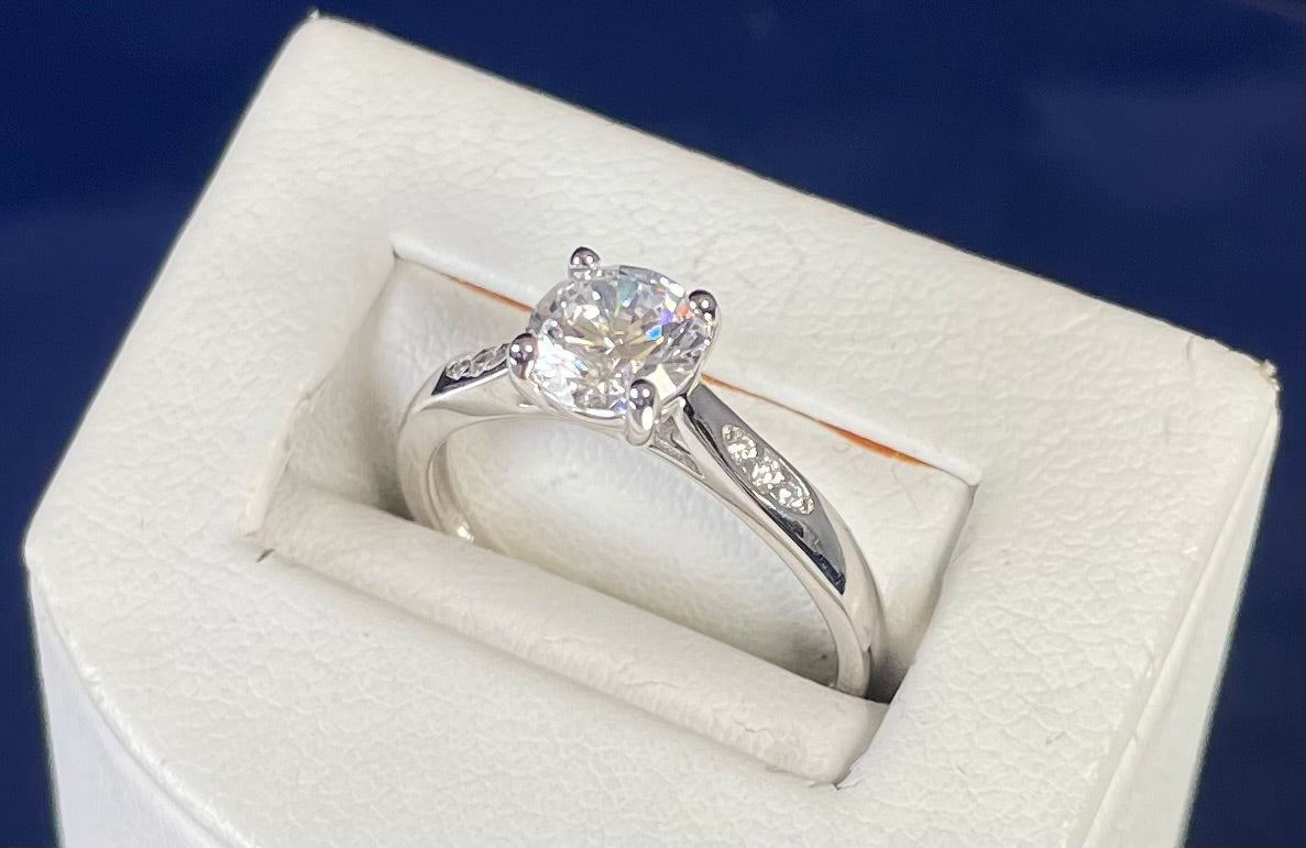 Brilliant Cut Cubic Zirconia Solitaire With Cubic Zirconia On Shoulder Rhodium plated