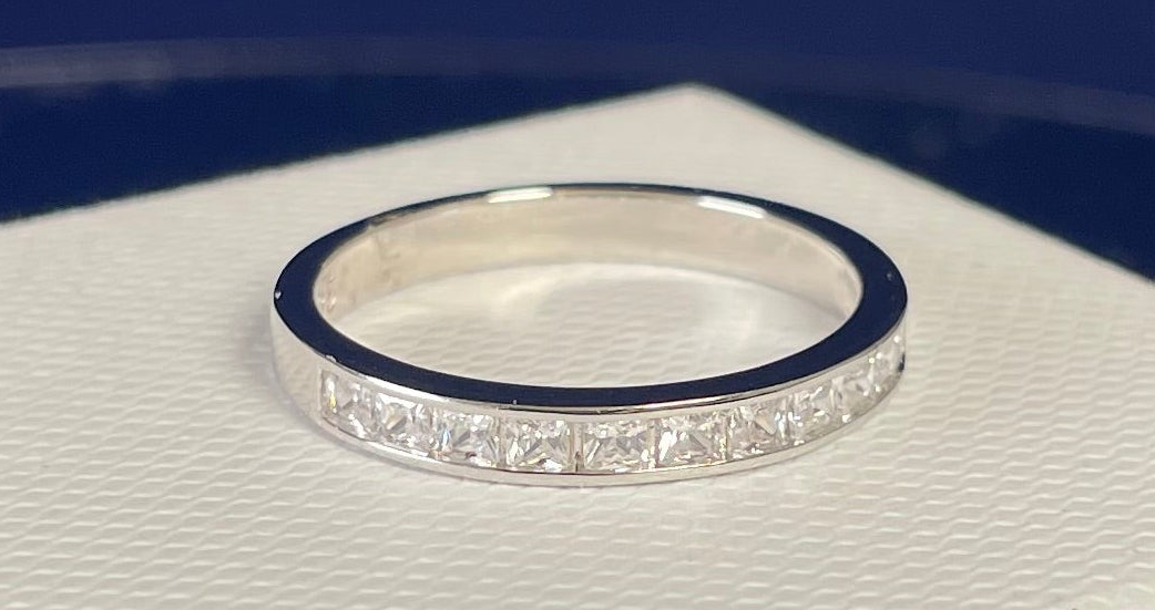 Half Eternity Channel Set Princess Cut Cubic Zirconia Rhodium Plated